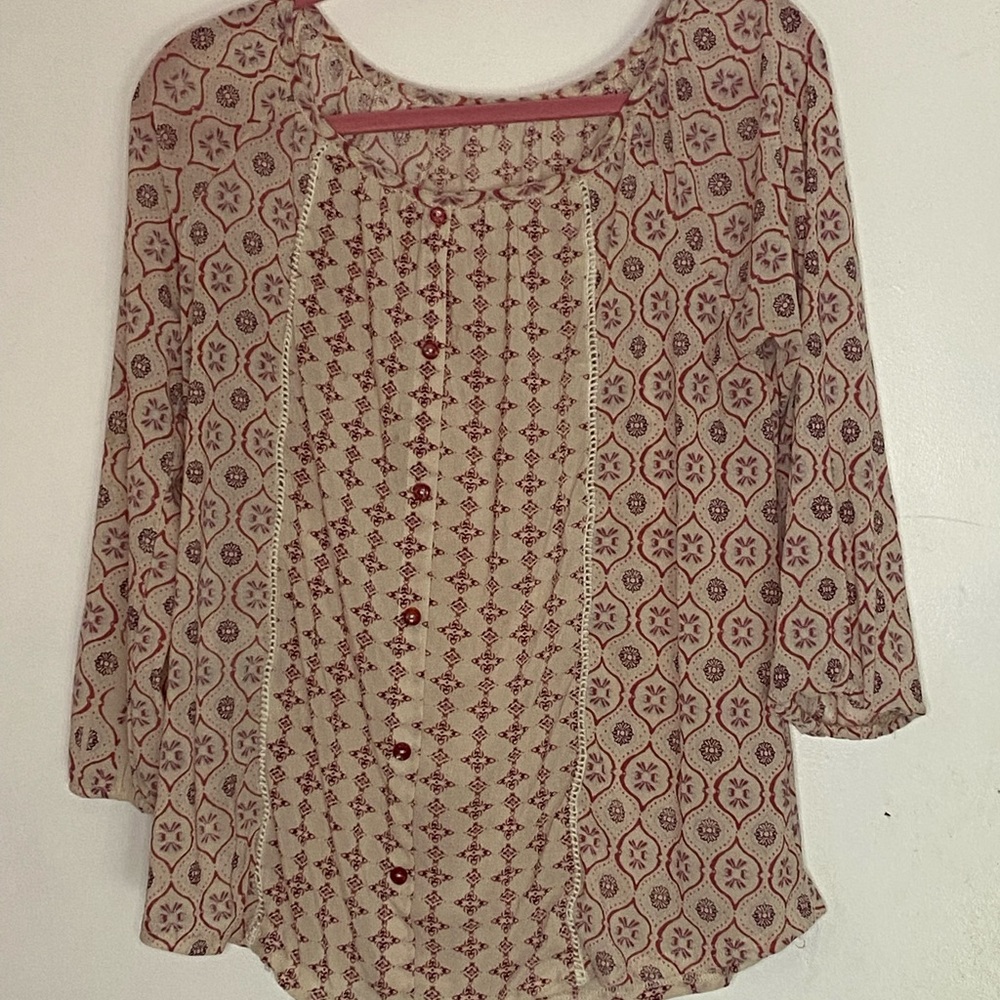 long sleeved buttoned pattern blouse